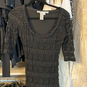Black body hugging dress